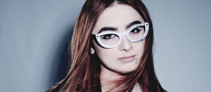female model wearing joiuss gatsby black & gold cat eye glasses 