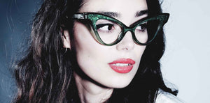 female model wearing joiuss glimmer clear black sparkle glasses